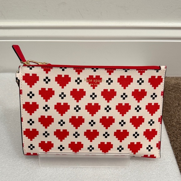 Kate Spade New York Devin Pixel Hearts Embossed Saffiano Leather wristlet pouch